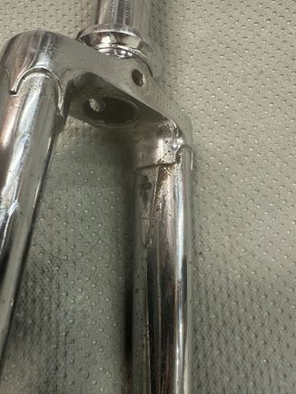 the paint thinner/paintbrush worked wonders on the fork crud. I thought it was oxidation but it came off pretty well. 