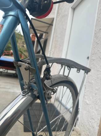 Hand made Pletscher rack support. I've put car batteries on this. I fondly remember the one time  I rode through Golden Gate Park with my girlfriend seated on it side saddle. 
