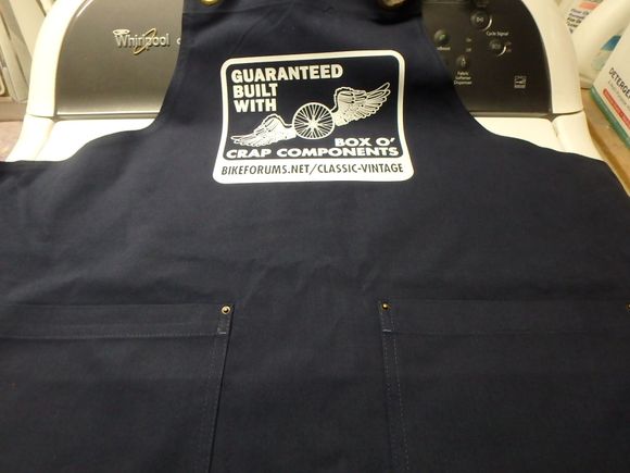 Aprons are heavy duty fabric with the BOC logo.  They are packaged in padded mailers from USPS and need to be folded so they will fit in the mailer.
