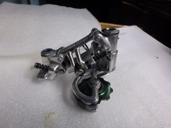 NR rear derailleur.  With upgraded sealed bearing pulleys with the correct spacing for the bolts and width of the bolts.