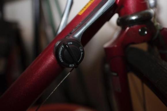 Don't be afraid of down tube shifters.  Properly adjusted just a simple pull or push to the next click is all you need to change gears so it isn't like your hand needs to be down there for a long time. 