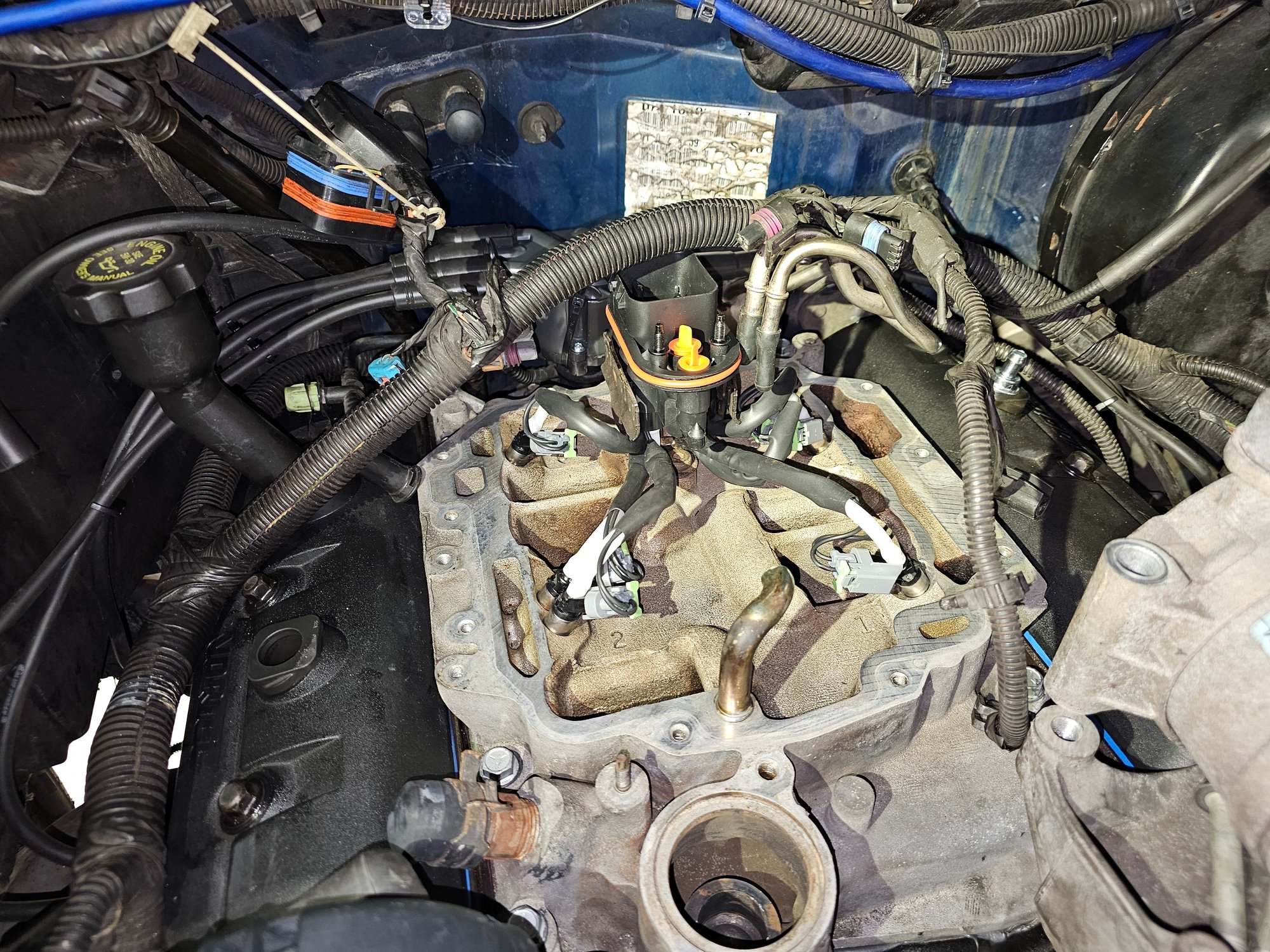 New style fuel injector. This one is Standard ignition brand. I also replaced the distributor cap, rotor, wires and NGK plugs. 