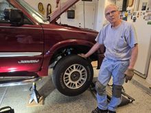 Proud gearhead buttoning up everything