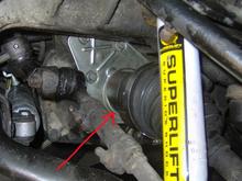 Arrow points to where the oil is leaking.


