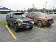 My buddy Nic's Blazer and mine. Lol ya that's a yellow stripe painted with the same paint that we used on the parking lot lines.