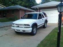 got it back from the body shop, changed up the look of the whole front end, blacked out head lights, sidemarkers, black emblem, painted grille and different painted bumper as well