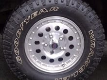 American racing ar23 from sears 15 x 7 with a 5.94 inch backspacing was for all four with balancing and mounting about $575... the tires are the (p235 75 r15 )duratrac from goodyear sold at sears as well for about that same price... so id say it was $1100 well spent on a great package if you cannot afford to lift but can get a sears credit card