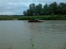 My old 95 k1500, 5 speed, 350, 4x4 also doubled as a submarine. 8 hrs and $900 to get it out of the Cattaragus creek. Not the deepest where it sits water came in the windows when we started crossing. Made it all the way across but was unsuccesful when we were on our way back thru.