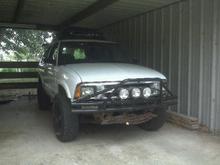 Now clocking 208k miles...new custom built bumper-thumper, and 3 KC lights.