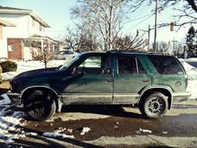 Parked in the driveway after a long snow melt.