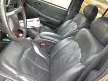 added heated, leather seats front and rear