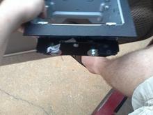 Used the stock radio mounts as a template and cut and bent mine out of abs plastic