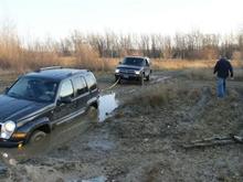 Notice the Bowtie is pulling the Jeep out. I was the only one that could get it out not the 2009 Ram OR the 4Runner