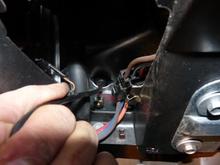 11 - Carefully pull parking brake cable through hold
