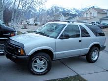 1996 4.3 V6 MT 4wd with Extreme wheels ... I finally like the wheel and tire combination for this truck.  235-70-r16 Tracker 2's.  It's a daily driver that see's more "Urban Wheelin'" vs. real off roading.