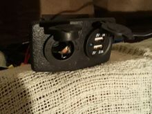 The center console plate with usb and ciglighter mounted