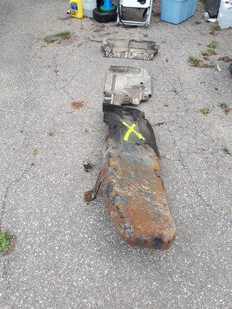 Gas tank metal plate. Was grinded and painted before install.