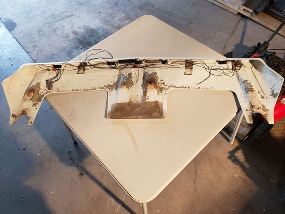 ...complete with a big arse screw attached to random rusty sheet metal piece.