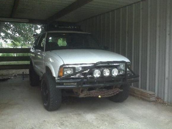 Now clocking 208k miles...new custom built bumper-thumper, and 3 KC lights.