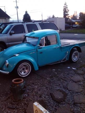 this is my vw now that ive had a chance to monkey with it. im gonna paint it hopefully this summer. im gonna go with a bone white in a matte finish. all my lights are clear and with the white walls i think the off white will look good. and matte is kinda hot rod. :)