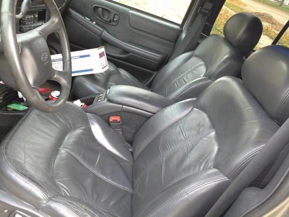 added heated, leather seats front and rear