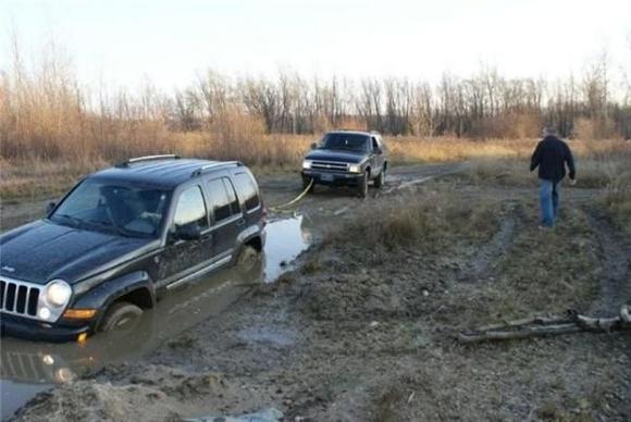 Notice the Bowtie is pulling the Jeep out. I was the only one that could get it out not the 2009 Ram OR the 4Runner