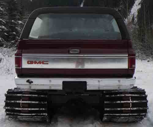 The only rust I have is in the rear window mechanism. Needs to be all replaced to make work again.
Rear bumper is 36 in off the ground which is about same height of oil pan. I've submerged/driven it in slush/water that was over the tracks.
It has a 350 cid, turbo 350 trans, H/L range 
Operating videos at:
http://www.youtube.com/watch?v=fDg5Cq145uU