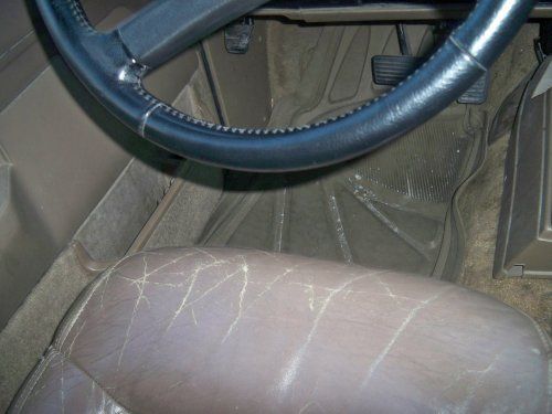 I won't fix the driver seat. Just get seat covers for the front and back. Not sure why I took this picture but I noticed the bulb is out. So I decided to check everything over. Found 2 other bulbs. The reading light and the third break light is out. Everything else is working for lights.