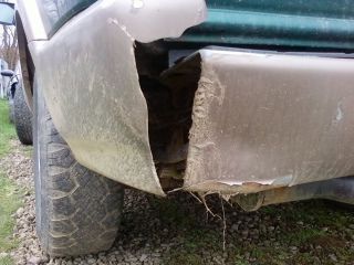better showing the rear bump damage