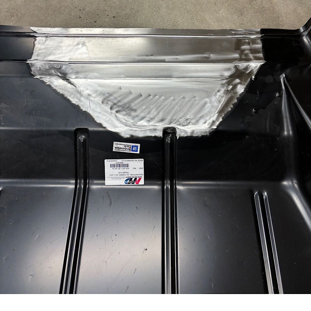 The 1970 Camaros did not have a fuel tank evaporator canister, so I had to modify the trunk floor to fit.