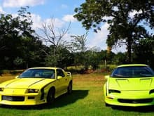 Mine and my sisters Camaros, alas the Green one is dead in my pasture right now.