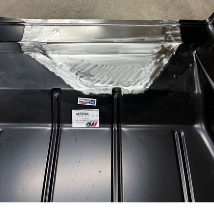 The 1970 Camaros did not have a fuel tank evaporator canister, so I had to modify the trunk floor to fit.