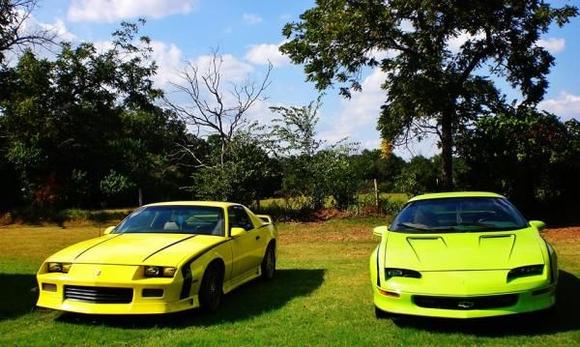 Mine and my sisters Camaros, alas the Green one is dead in my pasture right now.