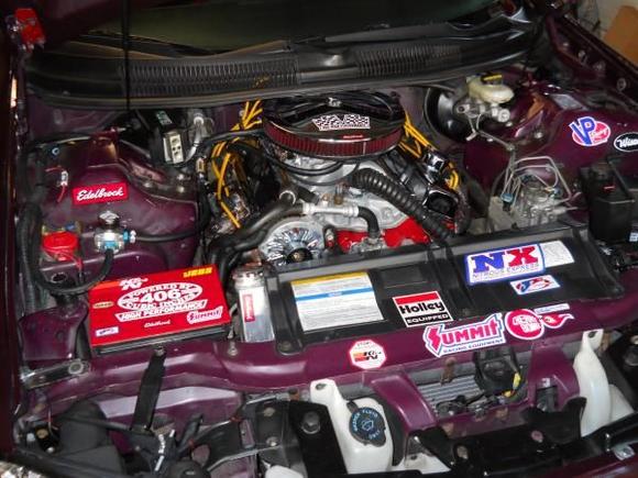 DSCN0472 with regulator in front pump in back an 3 wire 105 amp alternator,this the way it should be ,with plan for cast aluminum valve covers in the plans ,6.75 hamonic balancer will stop the 8 inch one from rubing on the sway bar. total upgrade of suspention comeing in the spring front shocks ball joint ,should drive like new car ,as wel as rear sway bar kit ,bump stops ,then the exhuast  rearend work alot of small things should improve handleing big time an driveability