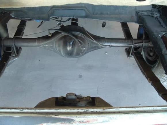 this photo shows looking into the camaro trunk the entire trunk floor cut out ,see my 9 inch. posi rear  i went with 370 gears so i can go in the interstate, the floor pan was bought at the carlise show saving on shipping,