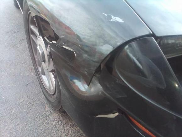 somebody destroyed my fender in a parking lot. didnt leave a name and insurance card or nothing. 4-11-10