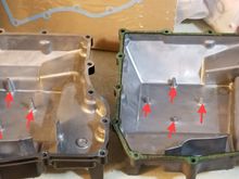 Here you can see on the 97 left the 4 indents the hold the oil pick up tube in the pan are longer than the ones on the 96 right.