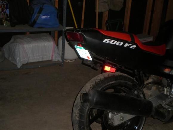after i took off the rear blinkers and mud guard i mounted my license plate right under my tail light