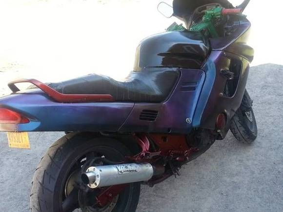 When I first got the bike,rattle can paint job full of runs,and zip tied together with broken body mounts.Tail lights not working and in need of a new CCT.