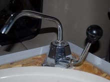 The faucet is a normal pump handle faucet from a camper supply store.