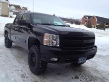 Front view with black grill.