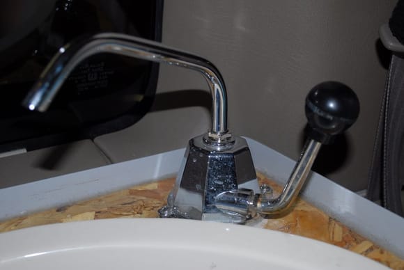 The faucet is a normal pump handle faucet from a camper supply store.