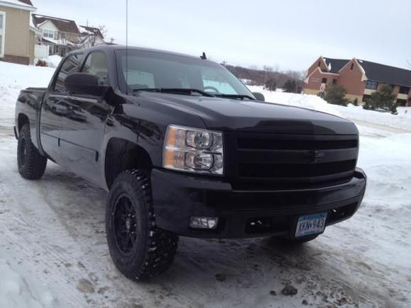Front view with black grill.