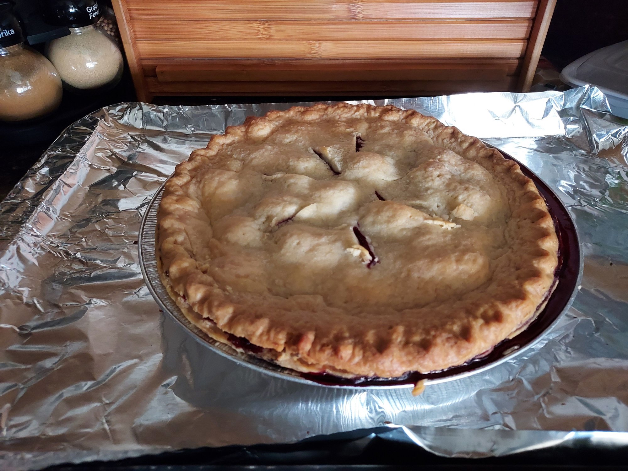 Razzlebery Pie fresh out of the oven.  Should be cool enough to have a slice in a couple of hours.  Vanilla icecream to go with it.