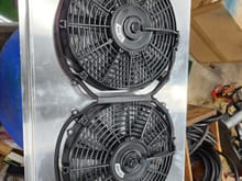 Cleaned up the fan wiring.  Most people put connectors on each fan and are fine with that.  I opted to extend the fan wiring a bit and offload those junk chinese connectors in favor of some delphi weatherproof connectors