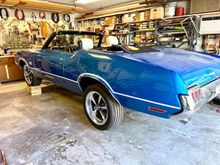 Put the front wheels on crib blocks and the hung the back of the car off jack stands to let the suspension droop for better access.