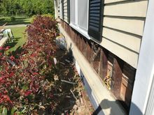 Random siding removal, nails pulled ready for new siding material.