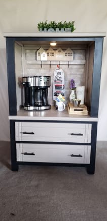 Just an old chest of drawers that she cut drawers/supports out of.and turned into a coffee bar.