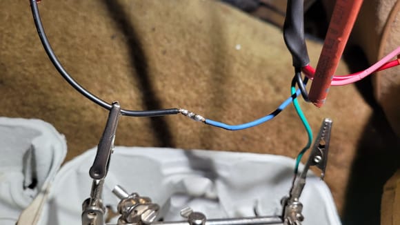 I decided to add about 20" of wire off the switches and soldered those wires to the 5-wire switch harness I made. I hate soldering in the car, but took my time and heat shrinker the connections afterwards.