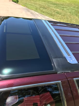 Moonroof with Dual interior shades ; Sliding Chrome luggage rack 
